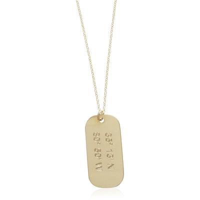 Lat & Lo Mini Dog Tag in 14k gold filled metal with custom coordinates engraving.