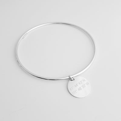 Lat & Lo charm bangle, sterling silver, engraved with coordinates, 16mm charm on wire bangle