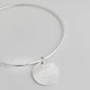 Lat & Lo charm bangle, sterling silver, engraved with custom back inscription, 16mm charm on wire bangle