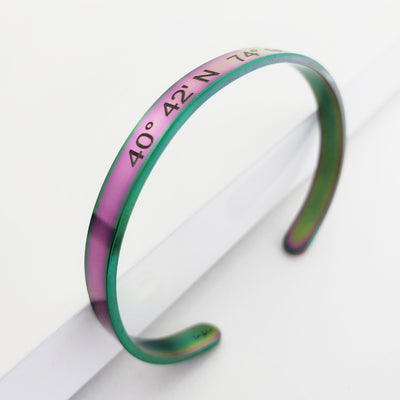 Coordinates cuff bracelet in Rainbow colored Stainless Steel Cuff Bracelet white background. Side View. By Lat & Lo. www.latandlo.com